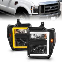 Projector Headlights W/ Light Bar Style Switchback Black Housing Clear Lens Pair Ford F-250 Super Duty/F-350 Super Duty 2010, Ford F-450/F-550 Super Duty 2008-2010 ANZO USA